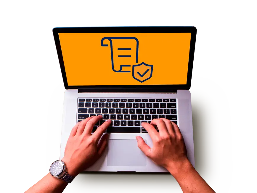 Imagen de las manos de una persona trabajando en un computador en referencia a los recaudos de seguros de Fianza de Seguros Caracas